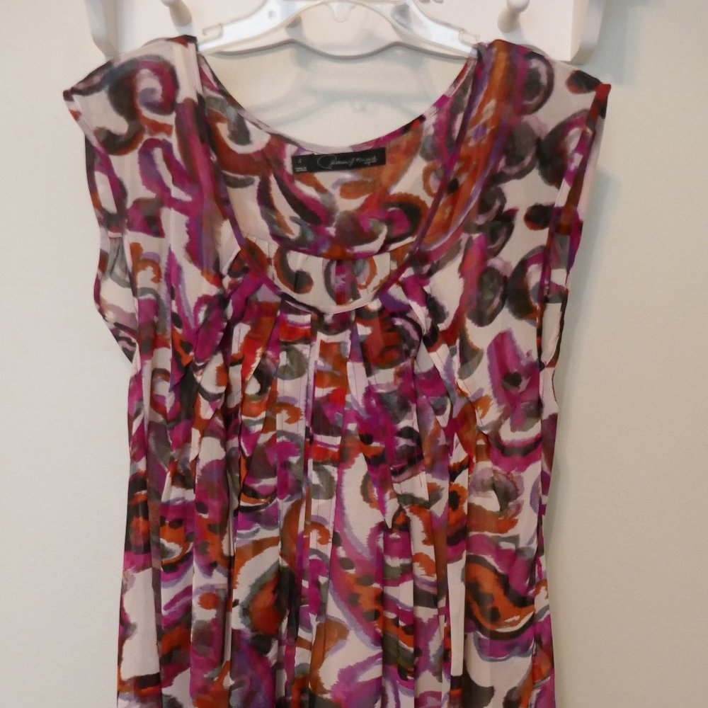 Multi coloured lightweight dress with cream knit slip. Size small.